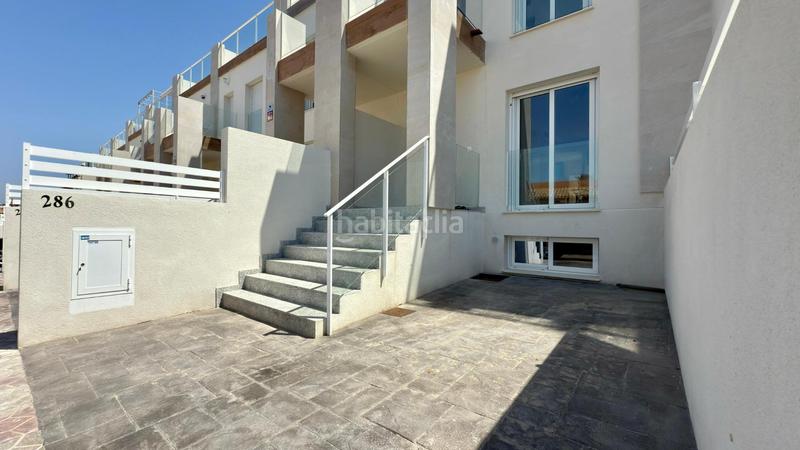 Foto c6d952b2-155d-4a35-b26b-7c54c97e9cb4. Alquiler casa dúplex con aparcamiento, piscina comunitaria, terraza con vistas maravillosas y a 5 minutos del mar. en Santa Pola