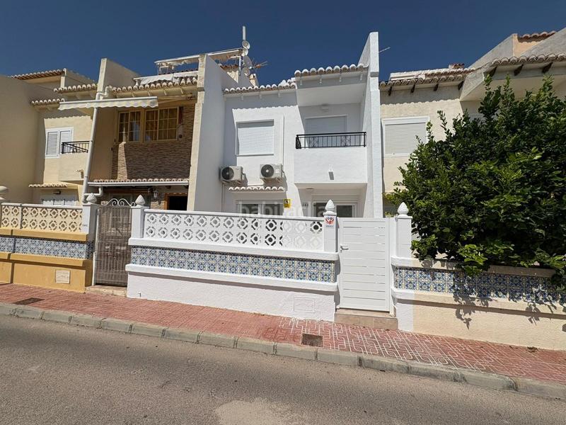 Foto a51bd7d3-0277-4597-a473-1afd009ad876. Maison jumelée avec parking dans Los Balcones-Los Altos Torrevieja