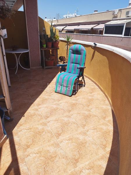 Foto bd9ebfdd-800a-45fb-a7db-fba2896956e6. Ático amplio ático con piscina y garaje. en Parque de las Naciones Torrevieja