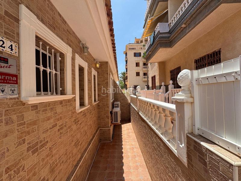 Foto 2c8dd95c-0925-45a1-9fe6-67b60502dcfe. Maison jumelée avec parking piscine dans El Moncayo - El Pòrtic Guardamar del Segura