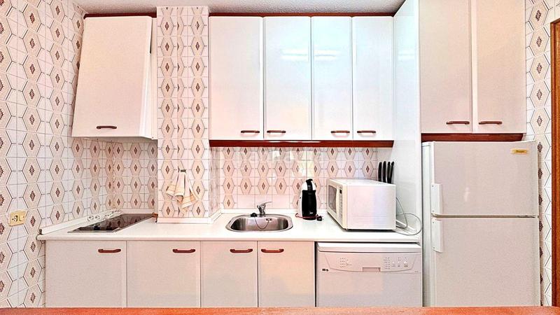 Foto d7f7937e-c0f3-4edf-b5dd-285aeb7c280a. Apartament amb calefacció piscina a Punta Prima Torrevieja