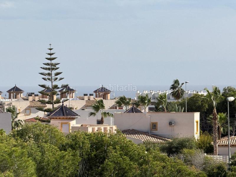 Foto 3d1cea25-691d-4287-84e7-ff5d514a875c. Casa a schiera con parcheggio piscina in Lomas de Cabo Roig - Los Dolses Orihuela