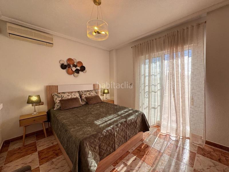 Foto afdc0d6b-95e4-43fb-8b69-d2d003e84c67. Casa a schiera con parcheggio piscina in Lomas de Cabo Roig - Los Dolses Orihuela