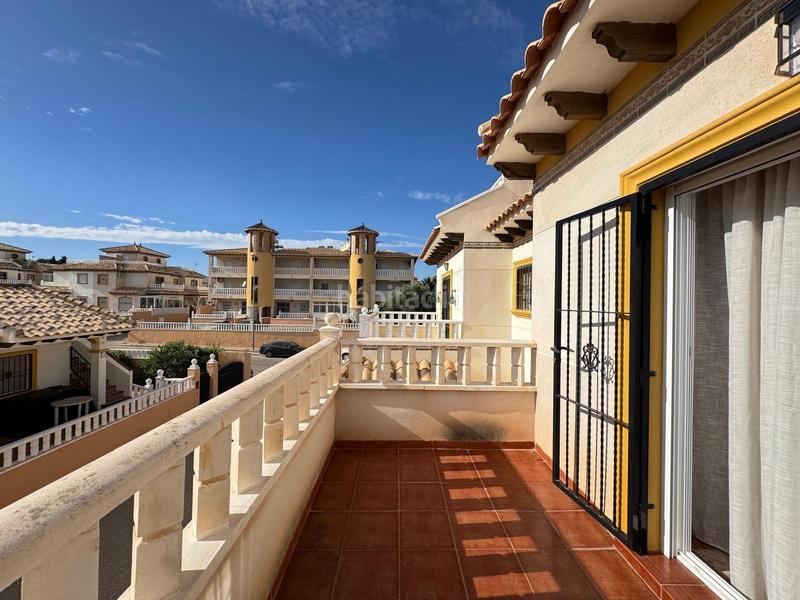 Foto b398c9e0-14fe-4be8-bf7d-b1fac1c372b0. Casa a schiera con parcheggio piscina in Lomas de Cabo Roig - Los Dolses Orihuela