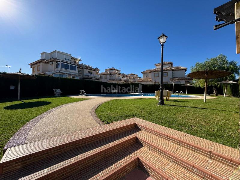 Foto b39e0b3b-a8bb-437f-b0d5-29fcc7fa3788. Casa a schiera con parcheggio piscina in Lomas de Cabo Roig - Los Dolses Orihuela