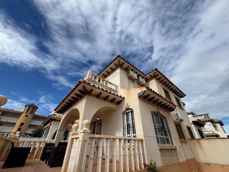 Foto b6902c4b-2b72-4cb5-a9c0-9aeaf4c020c5. Casa a schiera con parcheggio piscina in Lomas de Cabo Roig - Los Dolses Orihuela