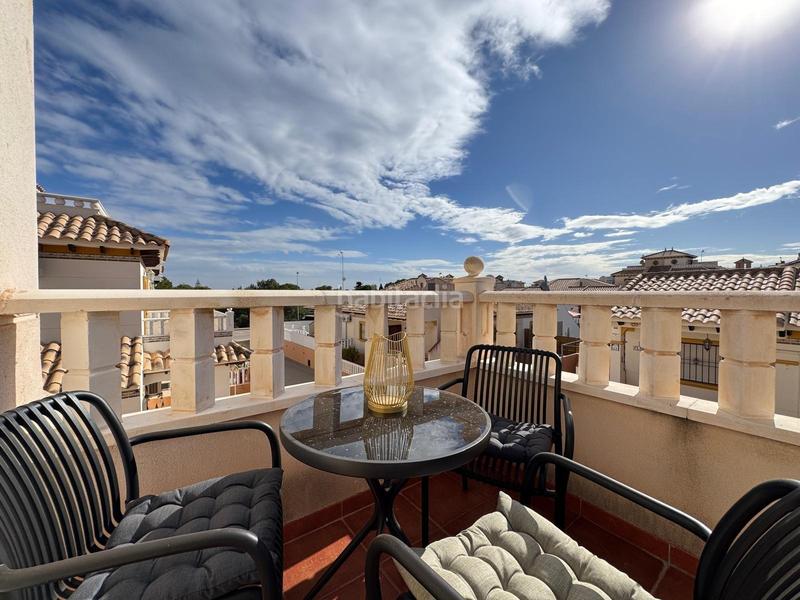 Foto cef6e4e3-1efd-49da-8d0e-7288c319fa36. Casa a schiera con parcheggio piscina in Lomas de Cabo Roig - Los Dolses Orihuela