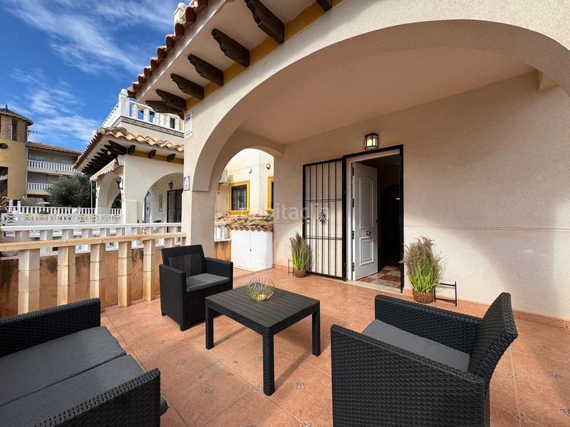 Foto d37f4afd-9eb1-419e-b5a1-724e6290e4d0. Casa a schiera con parcheggio piscina in Lomas de Cabo Roig - Los Dolses Orihuela