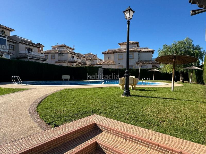 Foto dcb02f20-d641-4db4-8ffa-a28259be9b16. Casa a schiera con parcheggio piscina in Lomas de Cabo Roig - Los Dolses Orihuela