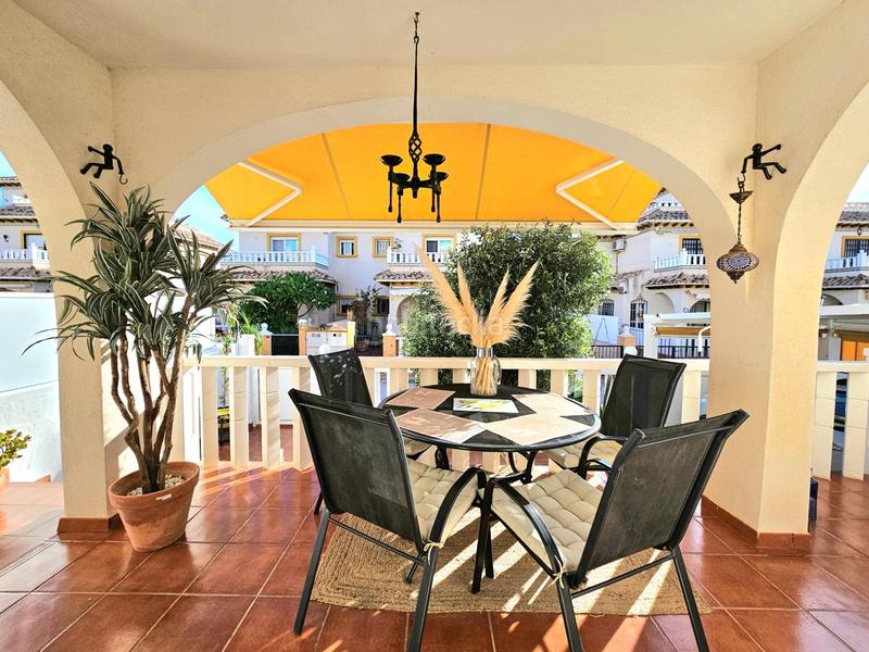 Foto 23b4745f-a5a4-40ed-949d-fb5793a26736. Casa adossada amb aparcament piscina a Lomas de Cabo Roig - Los Dolses Orihuela