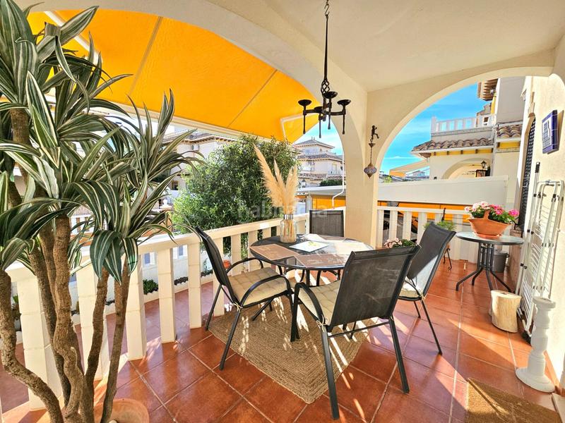 Foto 30498185-5635-4a2a-93f4-0ddd0f1c0a87. Casa adossada amb aparcament piscina a Lomas de Cabo Roig - Los Dolses Orihuela