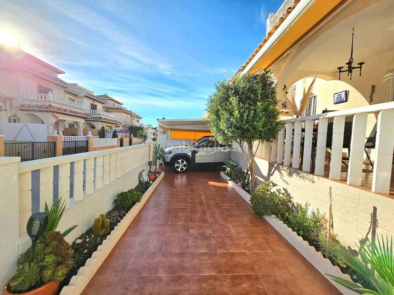 Foto c3849eca-b5ff-425b-93ee-964af0c5d31a. Casa adossada amb aparcament piscina a Lomas de Cabo Roig - Los Dolses Orihuela