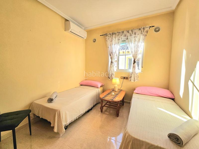 Foto e44d8a12-c9f2-4d57-a235-c7c584a62423. Casa adossada amb aparcament piscina a Lomas de Cabo Roig - Los Dolses Orihuela