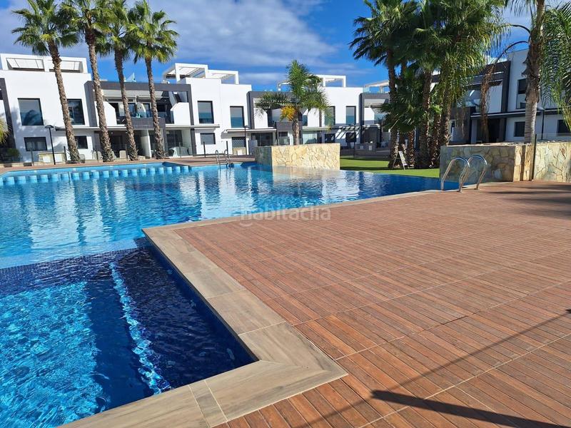 Foto af3cc972-98fd-4e59-b00e-68c14ede3d30. Casa amb aparcament piscina a La Zenia Orihuela