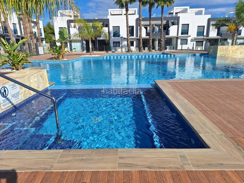 Foto ea08cadd-d406-47dd-86d4-b8382a9db007. Casa amb aparcament piscina a La Zenia Orihuela