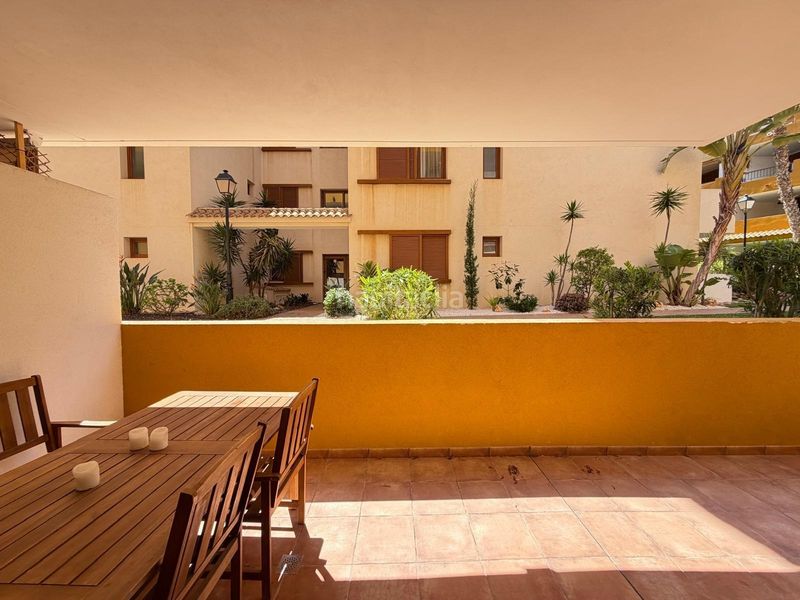Foto c9151e15-ad79-4ca7-b19a-41e7320e89c0. Apartament amb calefacció aparcament piscina a Punta Prima Torrevieja