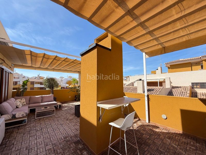 Foto 23c66829-81cd-494f-a3cb-79bc872b38a7. Àtic amb aparcament piscina a Punta Prima Torrevieja