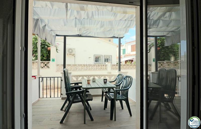 Foto 1312611f-82a8-4c6a-aa74-9d40c9f07c25. Casa a schiera con parcheggio in Sant Maurici Empuriabrava