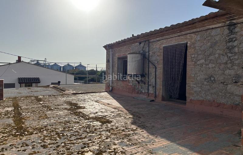 Foto 9938c0e4-e9d5-440c-a6d1-a2fbd47dd379. Chalet casa para reformar con local y 3 parcelas en Vilamacolum