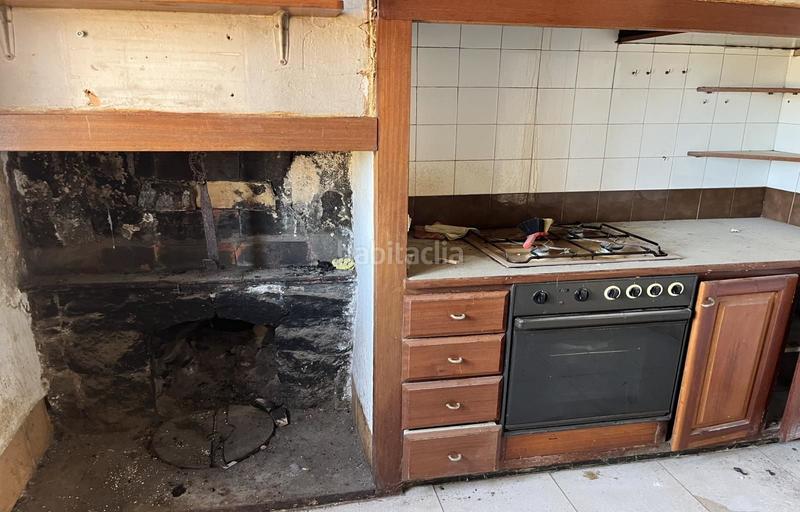 Foto a93acc52-ae86-4862-96c9-8a1ec0a1e8e3. Chalet casa para reformar con local y 3 parcelas en Vilamacolum