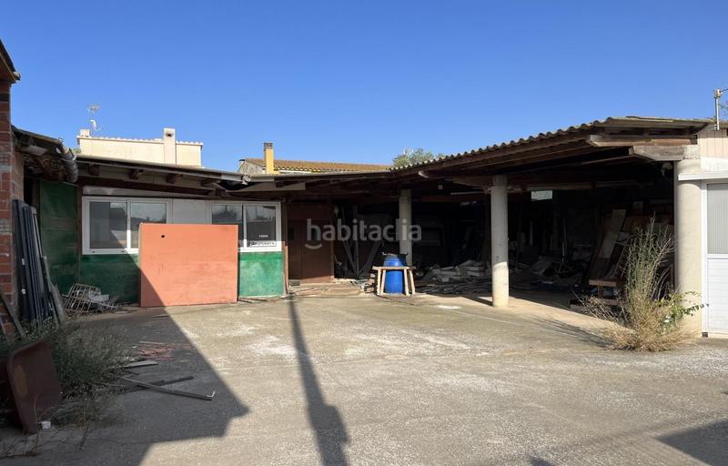 Foto cdc97d97-3fe5-45bc-a54b-d9553597d927. Chalet casa para reformar con local y 3 parcelas en Vilamacolum