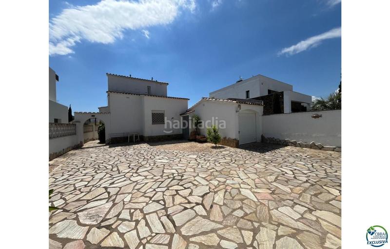 Foto 10d07edc-6a0d-4cee-b094-cb448a9be8b1. Chalet en venta casa al canal orientación sudeste , terreno de 542m2 y amarre de 12m en Empuriabrava