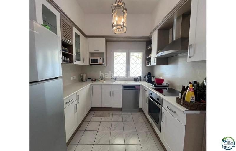 Foto 489b1234-3cfc-4d72-bae1-bf32527e4cea. Chalet en venta casa al canal orientación sudeste , terreno de 542m2 y amarre de 12m en Empuriabrava