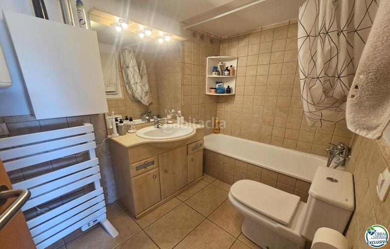 Foto 00343f28-5b23-43a7-a3f5-7bd337514c26. Appartamento con riscaldamento parcheggio terrazza in Empuriabrava