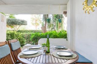 Appartement  Port joan. Acogedor apartamento con gran terraza y jardín en venta en roses