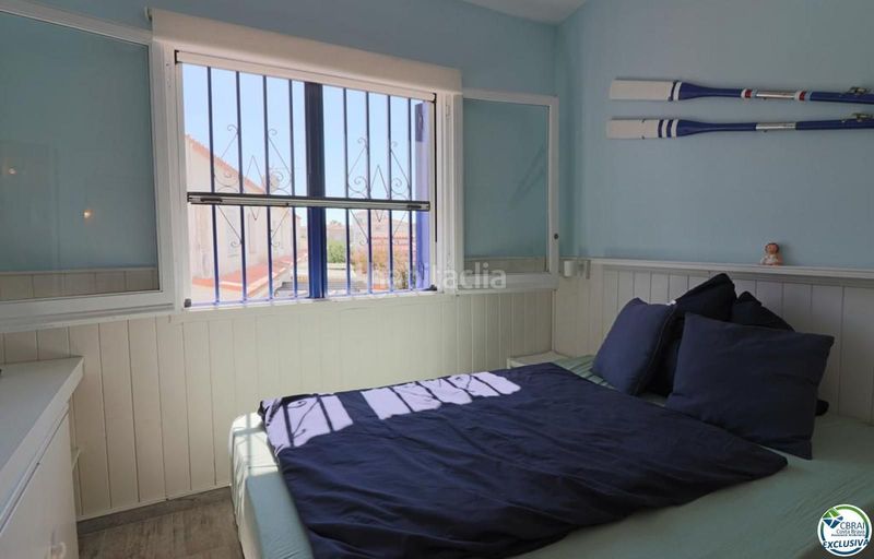 Foto 6fc6b9de-43ab-4ba5-b038-c7f220338b4e. Casa adosada pequeña casa con gran terraza en Sant Maurici Empuriabrava