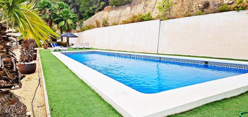 Foto 3b881500-5fac-4780-98be-d5ebed9fa81d. Lloguer casa adossada amb piscina a Oltamar - Cucarres Calp