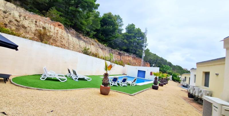 Foto f272f21f-8c50-4601-9863-b153fd7c0691. Lloguer casa adossada amb piscina a Oltamar - Cucarres Calp