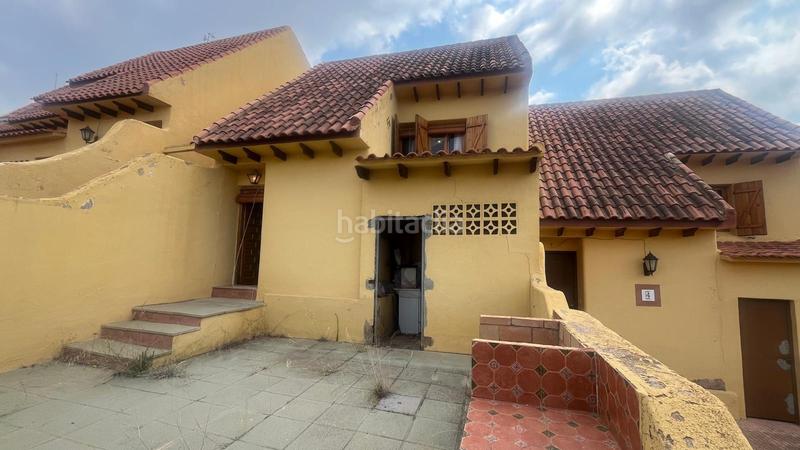 Foto f8efb62d-c04a-4c79-a464-275a245f94eb. Casa adossada amb xemeneia aparcament a Aledo
