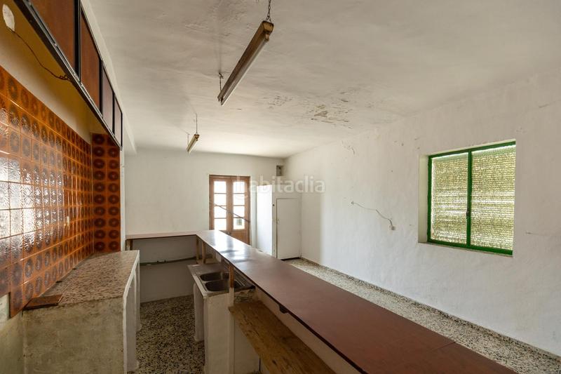 Foto 0de0dd5a-ca93-4742-8676-01adf44d066c. Casa a calle carretera 65 a Albuñuelas