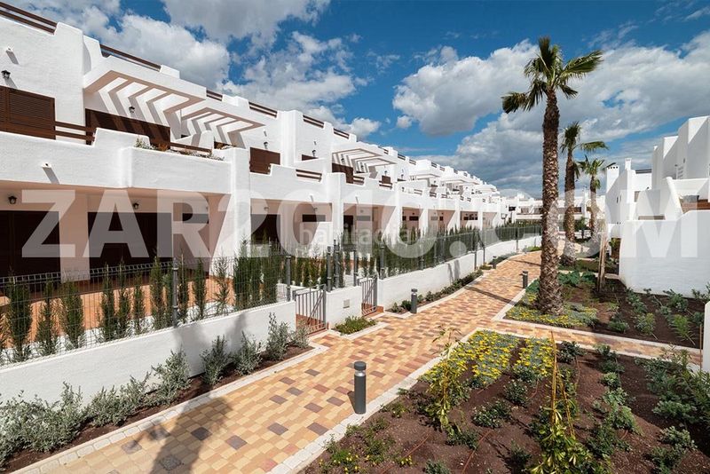 Foto 0086ab94-3700-4e8a-8f48-87677faef3fe. Planta baja residencial mar de pulpí fase 8 pisos de 3 dormitorios en primera línea de playa en San Juan de los Terreros