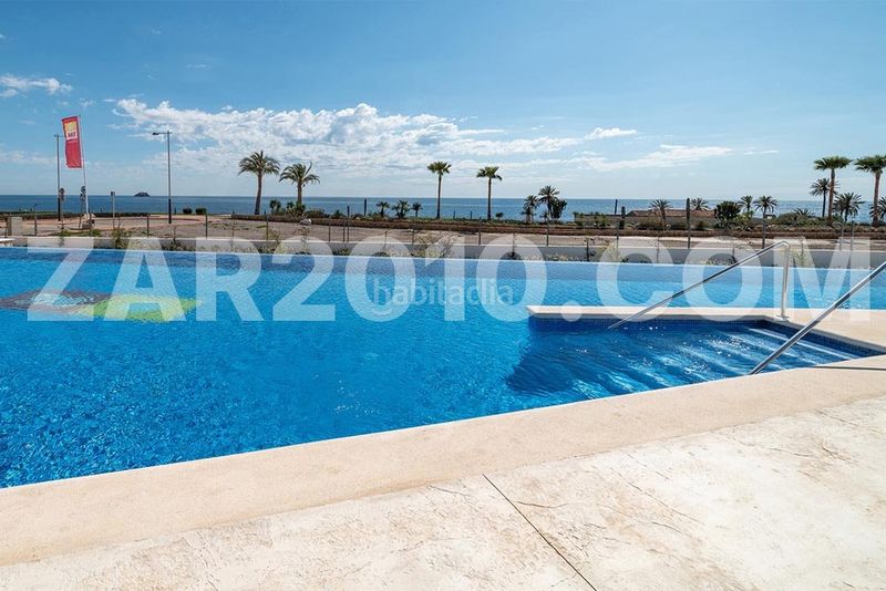 Foto 09526cd2-096a-41d8-8aa7-efde12b1393b. Planta baja residencial mar de pulpí fase 8 pisos de 3 dormitorios en primera línea de playa en San Juan de los Terreros