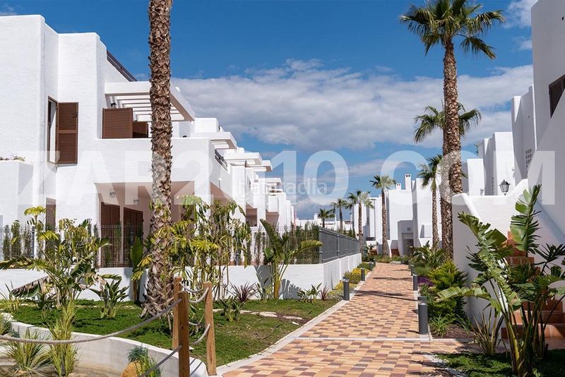 Foto 0fd00973-86e7-41eb-94c0-16b59bad4359. Planta baja residencial mar de pulpí fase 8 pisos de 3 dormitorios en primera línea de playa en San Juan de los Terreros