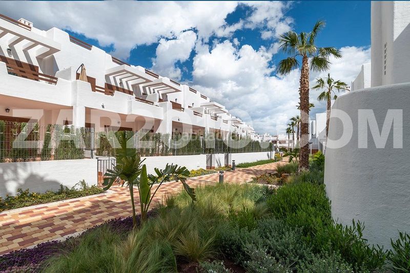 Foto 229d74fb-30f9-4818-821d-dfd3af700936. Planta baja residencial mar de pulpí fase 8 pisos de 3 dormitorios en primera línea de playa en San Juan de los Terreros