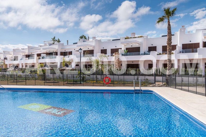 Foto d2457ab0-57d9-4ef2-8960-9742460f03d1. Planta baja residencial mar de pulpí fase 8 pisos de 3 dormitorios en primera línea de playa en San Juan de los Terreros