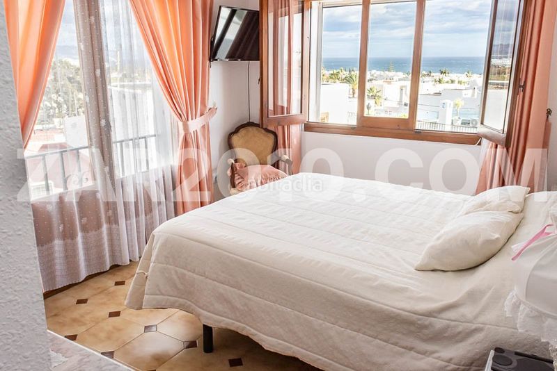 Foto f1c9ce59-fad4-4b3a-bdc0-212d5df8ee24. Chalet avec parking dans El Palmeral Mojácar