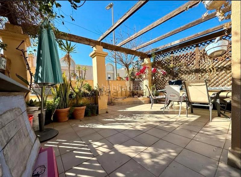 Foto efc61e86-5509-419a-b5b0-bd598cb7d16d. Casa adossada amb xemeneia a Aguadulce Sur Roquetas de Mar