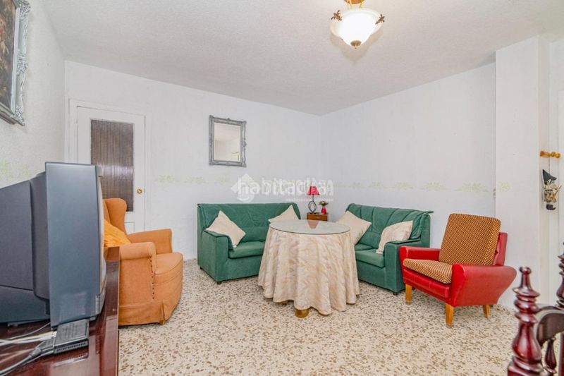 Foto f415343f-e9d8-40d0-8ba5-34f61e157d80. Casa aparellada a Poniente Armilla