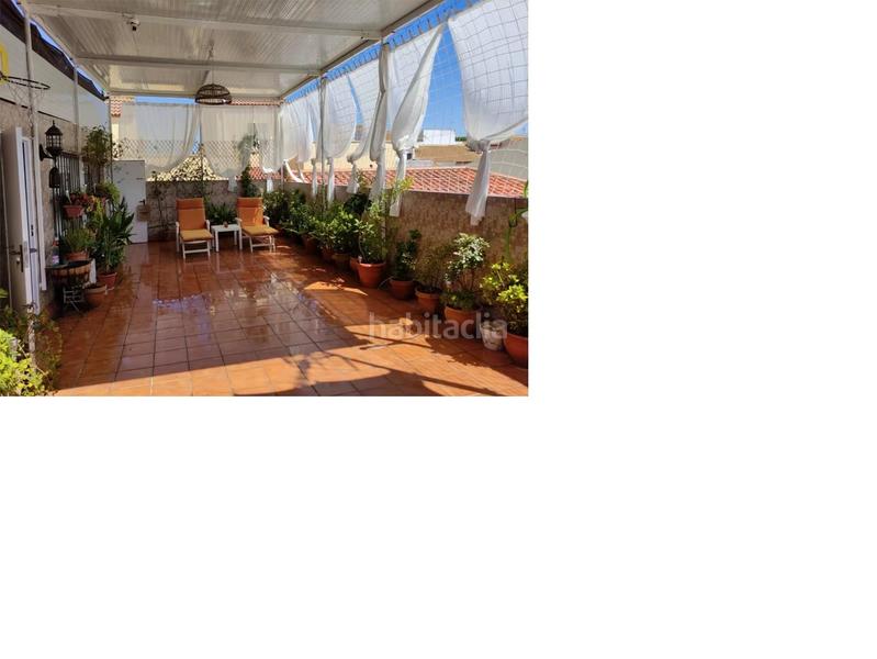 Foto c1d0185e-6812-4113-948d-3e8ee1936c07. Maison jumelée dans Guillena pueblo Guillena