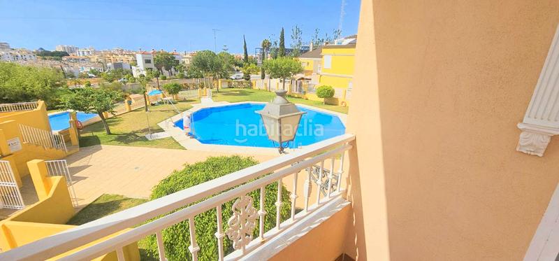 Foto e76c6897-7055-4c8b-9f4d-a50972616bda. Casa adossada amb aparcament piscina a El Tomillar Torre del Mar