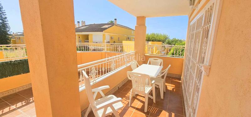 Foto fd6ce860-3cfa-4da8-9570-cea01159e223. Reihenhaus mit parking pool in El Tomillar Torre del Mar