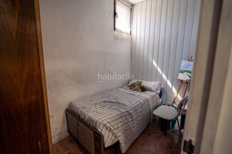 Foto f64e4060-0bd9-4b9a-8552-cf12c2c776d9. Casa adossada a Mura