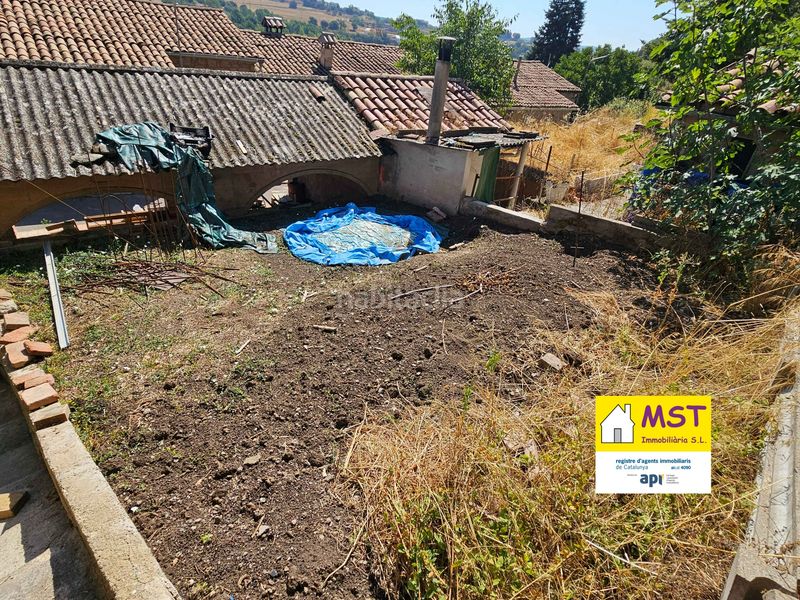 Foto 4d224472-26ea-4044-84ad-900b0c0b9d7d. Casa adossada amb xemeneia calefacció a Casserres