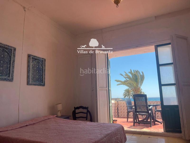Foto 1f11e561-1a55-4491-bd1b-692bff7a26b2. Casa alegre y luminosa casa frente al mar. en primera línea de playa . en Garrucha