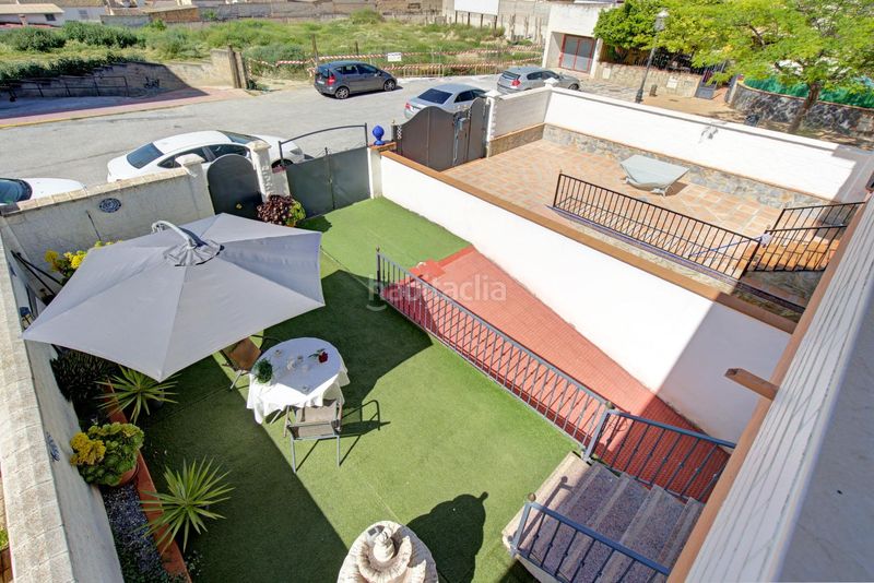 Foto 7a85c16d-61f7-46b1-ac0a-88314d846010. Casa adossada amb aparcament a Atarfe