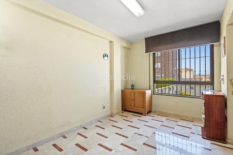 Foto 8470ad09-d438-40c9-add2-6a77ad72ffd4. Casa adossada amb aparcament a Atarfe